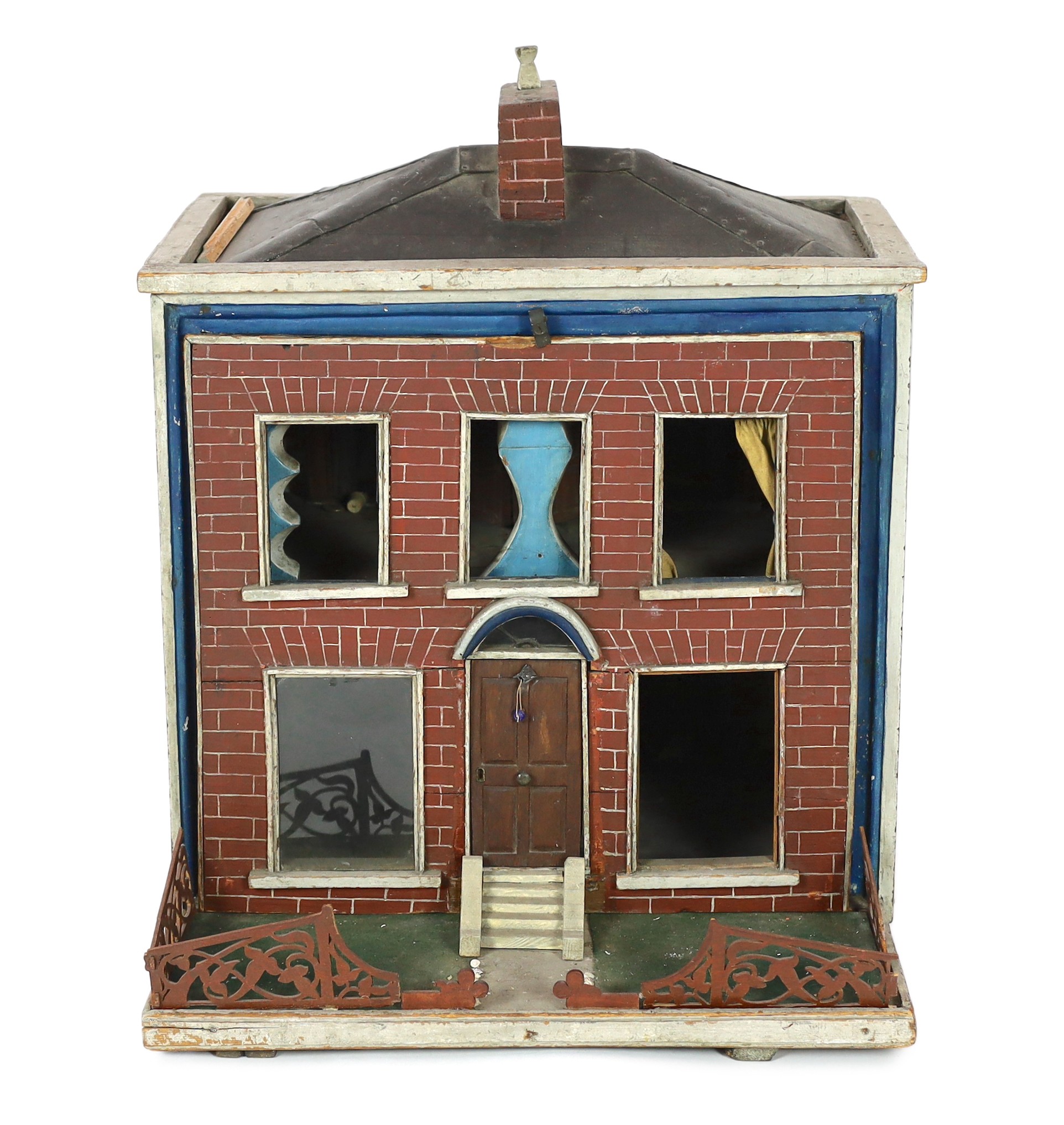 An extraordinary English dolls’ house, mid 19th century, 62cm high